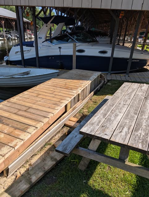 A new section of decking framed and boarded at the water's edge. — Georgian Bay, Ontario