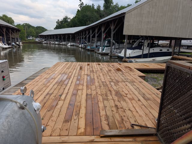 A wide decked landing boarded out at the head of the channel. — Georgian Bay, Ontario